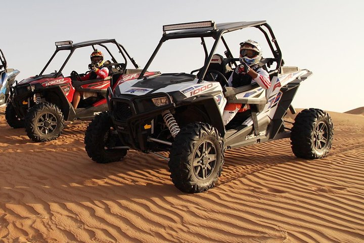 Experience the thrill of self-driving dune buggies across Dubai's stunning desert landscape followed by an indulgent international buffet dinner under the starry sky.